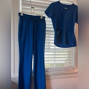 Barco One blue scrubs only worn once! The pants are Small Talls & Top is a Small